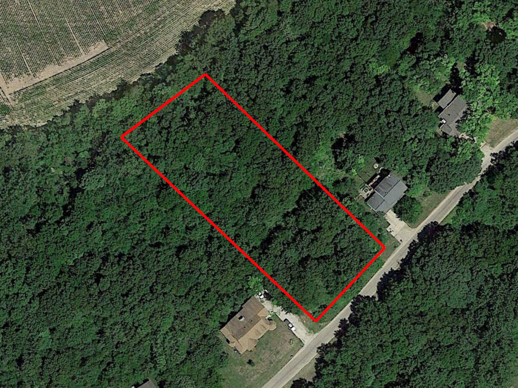 Over an acre treed lot in Chillicothe - Image 1