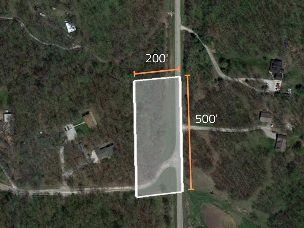 Well over an acre on a corner lot in a beautiful town - Image 1