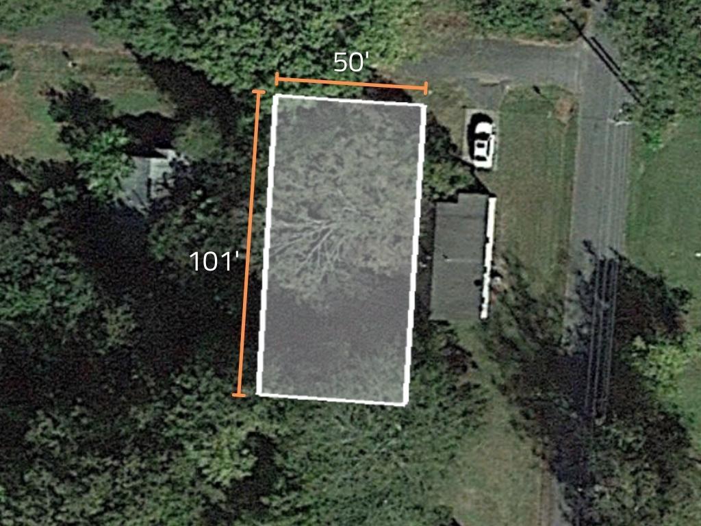 Lot in a well maintained neighborhood next to picturesque White River - Image 1