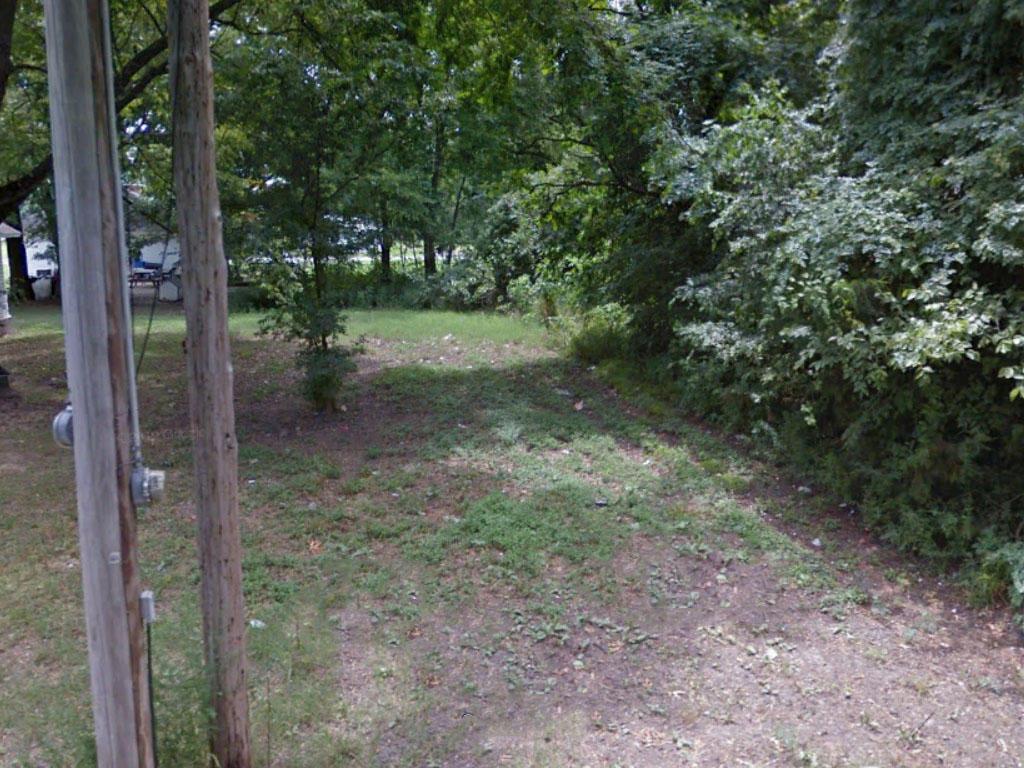 Lot in a well maintained neighborhood next to picturesque White River - Image 3