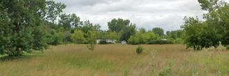 Almost an acre in the gorgeous city of Saginaw close to the bay