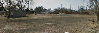 Nice sized corner lot in a small Texas town surrounded by farmland